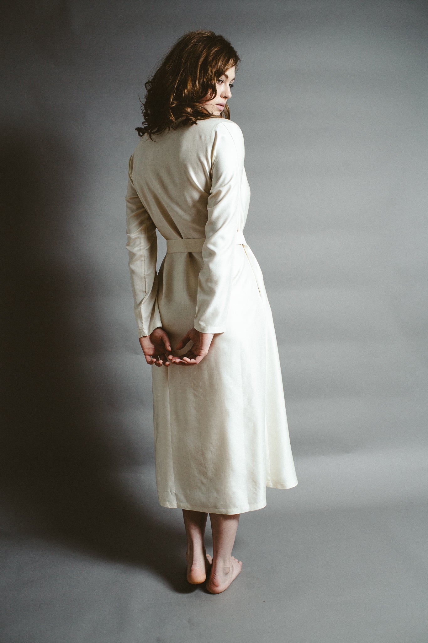 A lady wearing a natural coloured mulberry silk robe